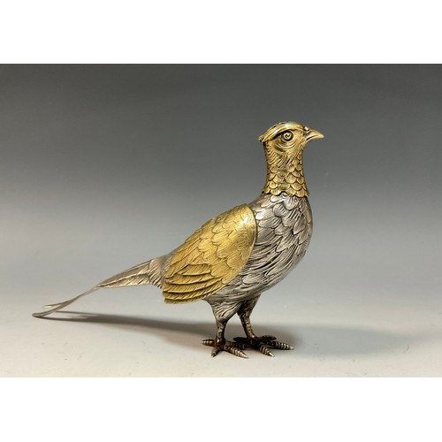 7 - A Continental silver and silver gilt novelty pepperette or casting bottle, as a pheasant, with detac... 