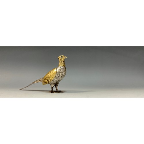 7 - A Continental silver and silver gilt novelty pepperette or casting bottle, as a pheasant, with detac... 