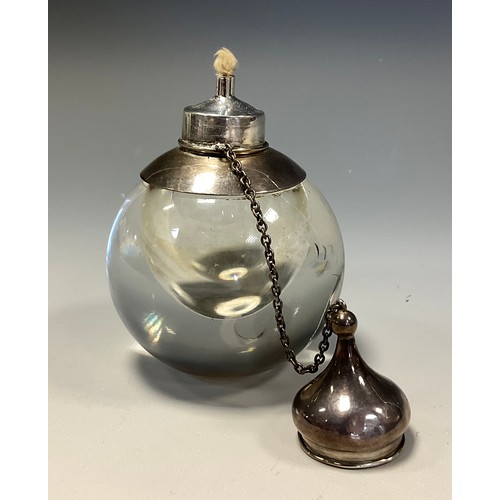 70 - An unusual Edwardian silver and clear glass globular table cigar lighter, onion dome cover, 11cm hig... 