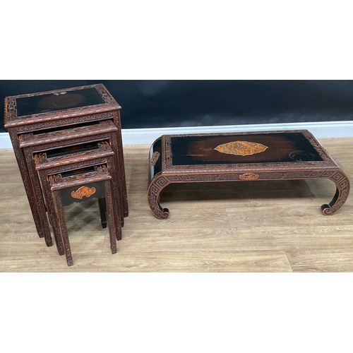 200A - A set of Chinese quartetto tables; a Chinese coffee table (2)