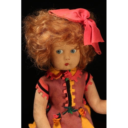 4016 - A 1930's Lenci (Italy) felt doll, the pressed felt head with painted features including black eyebro... 
