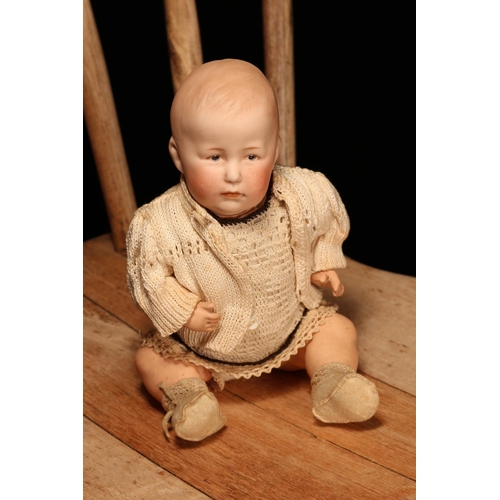 4021 - A Gebrüder Heubach (Germany) bisque head and jointed painted composition bodied character doll, the ... 