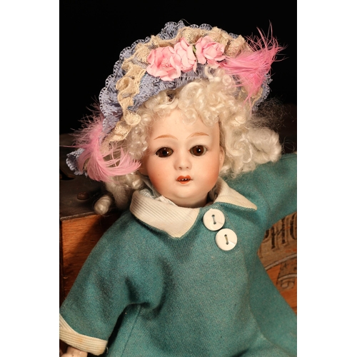 4022 - A Gebrüder Heubach (Germany) bisque head and jointed painted composition bodied doll, the bisque hea... 