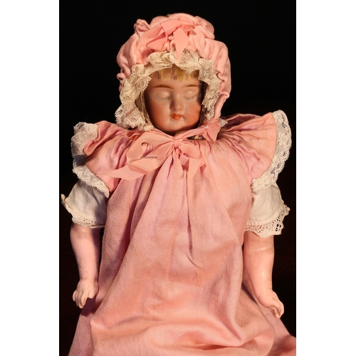 4026 - A German multi-faced bisque head doll, attributed to Carl Bergner, the moulded bisque head with swiv... 