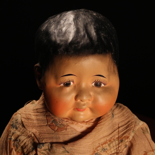 4033 - An early 20th century Horsman 'Baby Butterfly' painted composition head doll, the painted compositio... 