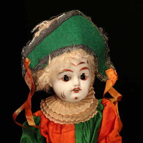 4038 - A French bisque head and jointed painted composition bodied novelty Clown or Pierott, the white bisq... 