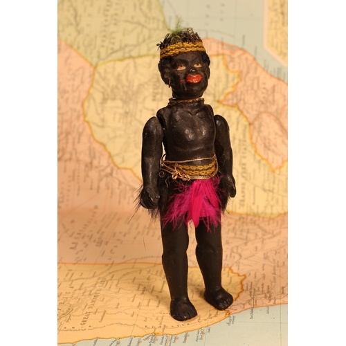 4049 - An early 20th century black composition jointed doll, painted features, black flock type hair, 15cm ... 