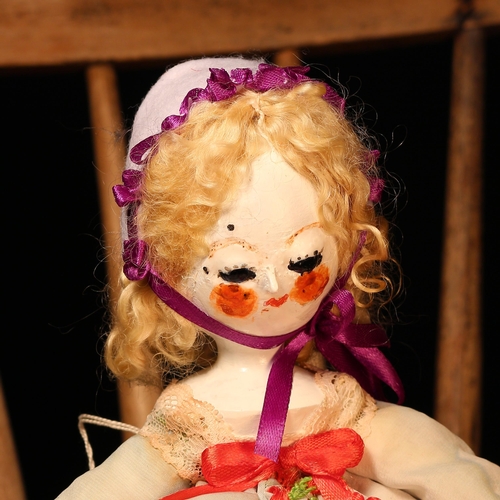 4075 - A reproduction 'Queen Anne' style carved and painted wooden artist doll, the carved and painted head... 