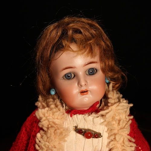 4087 - A Simon & Halbig/Kämmer & Reinhardt (Germany) bisque head and painted composition bodied doll, the b... 