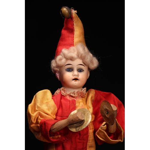 4094 - A Gebruder Knock (Germany) bisque head novelty 'automaton' type doll, in the form of a Jester, the b... 