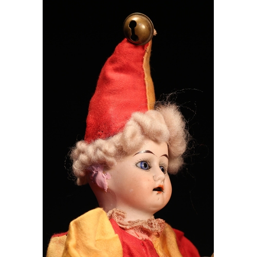 4094 - A Gebruder Knock (Germany) bisque head novelty 'automaton' type doll, in the form of a Jester, the b... 