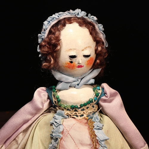 4099 - A reproduction 'Queen Anne' style carved and painted wooden artist doll, the carved and painted head... 