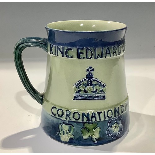 19 - A William Moorcroft commemorative mug, coronation of Edward VII and Queen Alexandra 1902, designed b... 