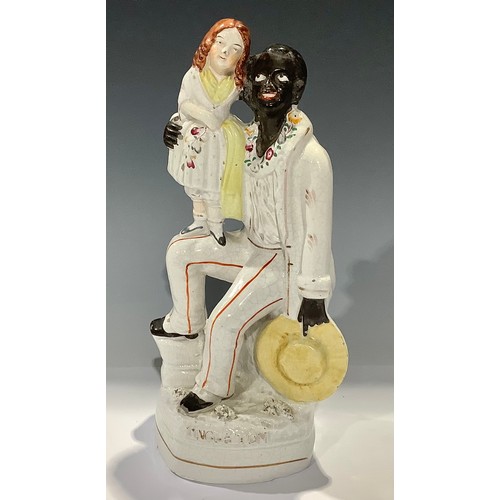 39 - A 19th century Staffordshire flatback, Uncle Tom and Little Eva, 29cm