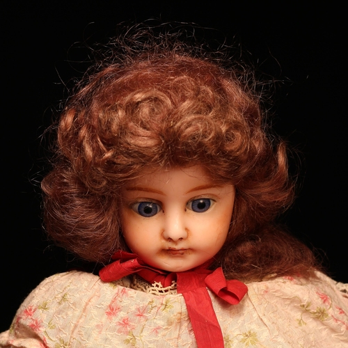 4118 - A wax over composition shoulder head doll, the wax over composition shoulder head inset with fixed b... 