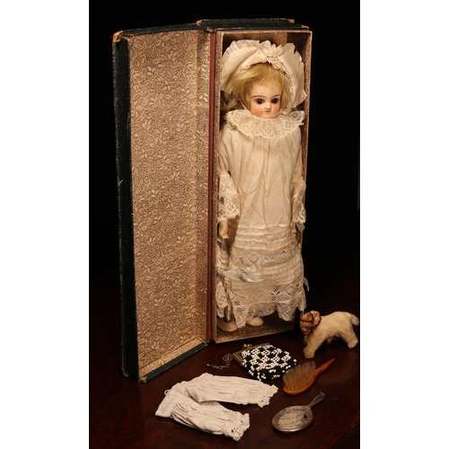 4120 - A bisque shoulder head doll, the bisque shoulder head inset with fixed brown glass eyes, painted fea... 