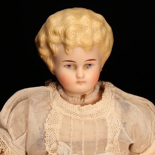 4133 - An Alt, Beck & Gottschalck (Germany) bisque shoulder head doll, the bisque shoulder head with painte... 