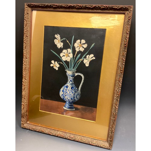 175 - E. Isneath (British school, early 20th century), 
Narcissi in a blue and white ewer 
signed, dated 1... 