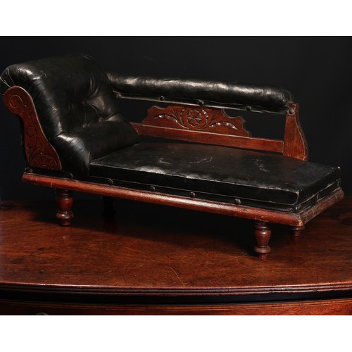 4136 - A late 19th/early 20th century buttoned-back dolls chaise longue, of small proportions, black leathe... 