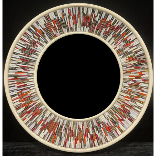 317 - A Piaggi Roulette circular looking glass, the central mirror plate framed by a multicoloured sunburs... 