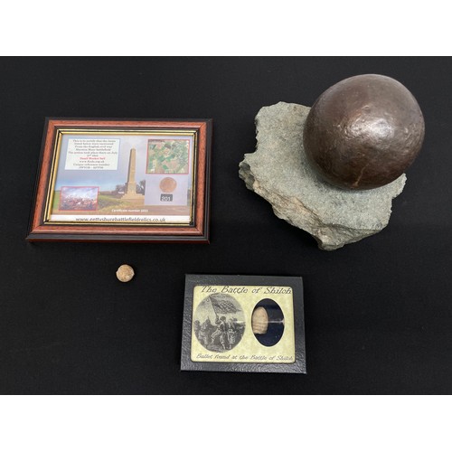 2049 - A cannon ball approx. 85mm in diameter of unknown origin on a rock display mount; An American Civil ... 