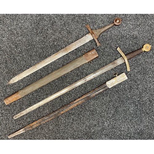 2053 - Pair of film prop German Swords in Crusader style: One with double edged blade, blunt round tip, 875... 