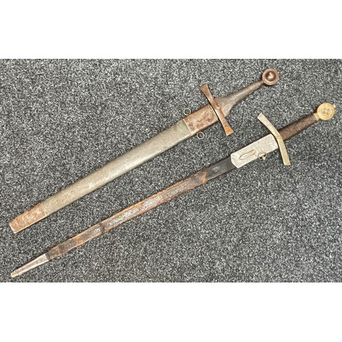 2053 - Pair of film prop German Swords in Crusader style: One with double edged blade, blunt round tip, 875... 