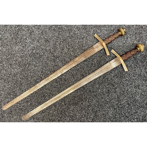 2054 - Matching pair of German film prop Swords with double edged fullered blades 800mm in length, blunt ti... 