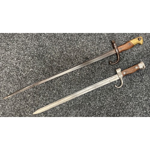 2056 - French Gras bayonet with single edged blade 520mm in length, maker marked and dated 1877 on spine. W... 