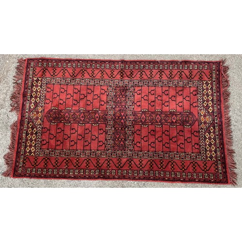 638 - An Afghan Baluch type wool rug or carpet, 150cm x 93cm