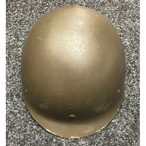 2113 - WW2 US M1 Helmet with swivel bale chinstrap. Rear seam. Heat stamp number 117B. Fitted with a postwa... 