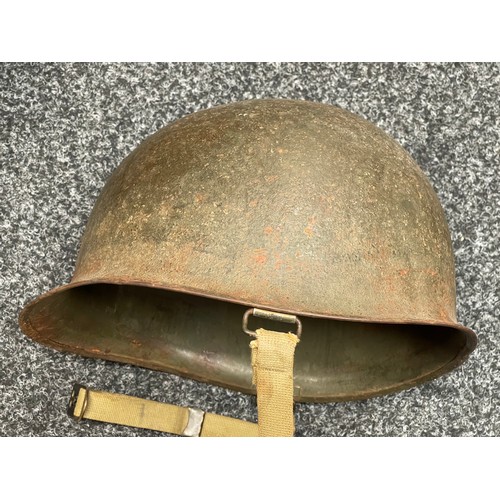 2113 - WW2 US M1 Helmet with swivel bale chinstrap. Rear seam. Heat stamp number 117B. Fitted with a postwa... 