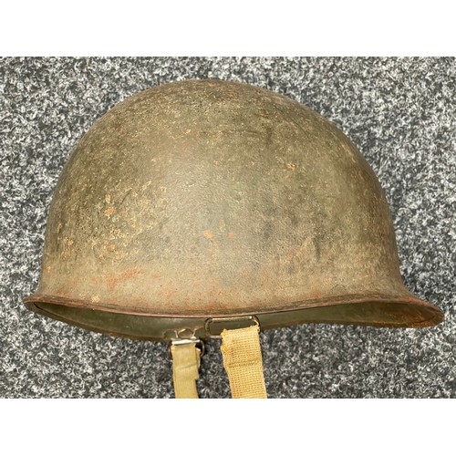 2113 - WW2 US M1 Helmet with swivel bale chinstrap. Rear seam. Heat stamp number 117B. Fitted with a postwa... 