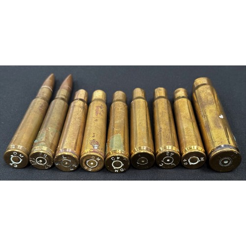 2139 - WW2 US .50 cal rounds x 2, plus WW2 US .50 cal empty cases x6, WW2 British 2prd No1 MKII Anti Tank g... 