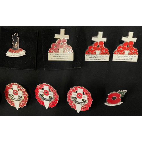 2238 - Enamel Poppy Day lapel badges to include: four 1914-2014 Lest We Forget badges: three 