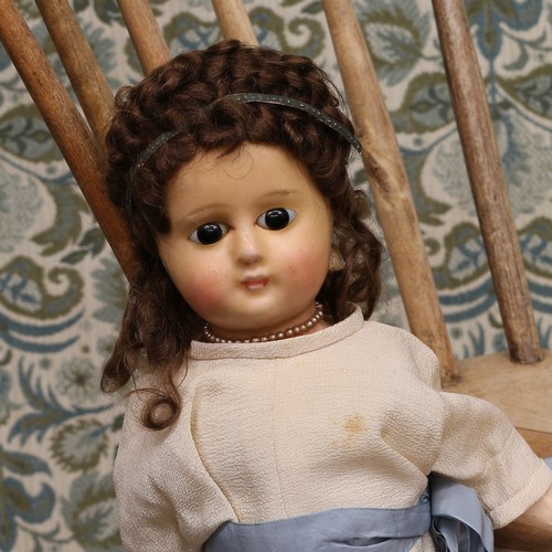 6285 - A late 19th century wax over composition shoulder head doll, the wax over composition shoulder head ... 