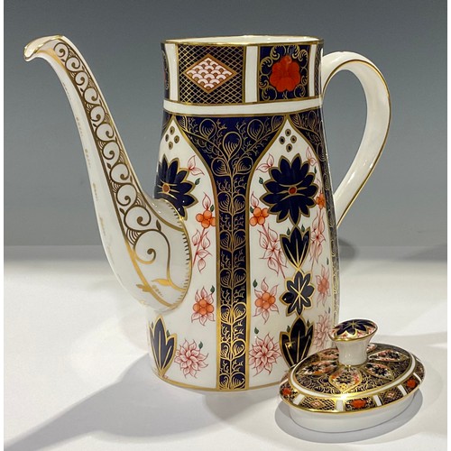 44 - A Royal Crown Derby 1128 Imari pattern coffee pot and cover, 22cm high, first quality