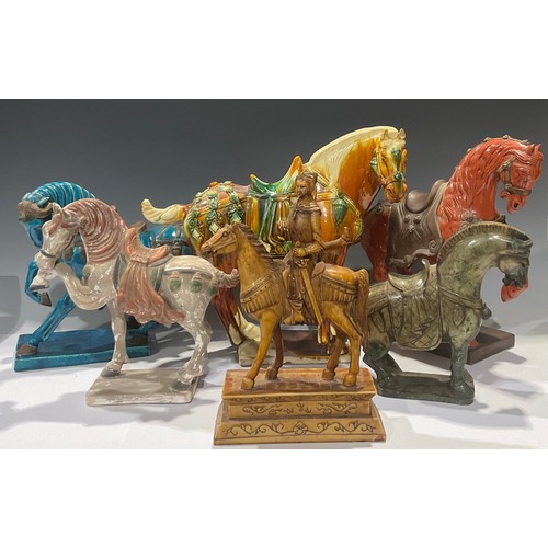 59 - A Chinese Tang Dynasty style model of a horse, 27cm high; an Italian Majolica Tang style model of a ... 