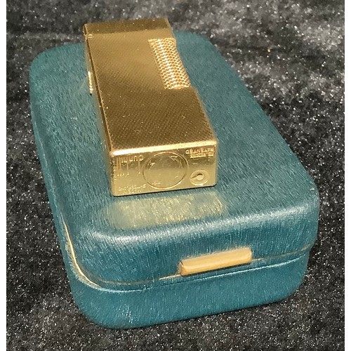 97 - A Dunhill Rolagas cigarette lighter, cased