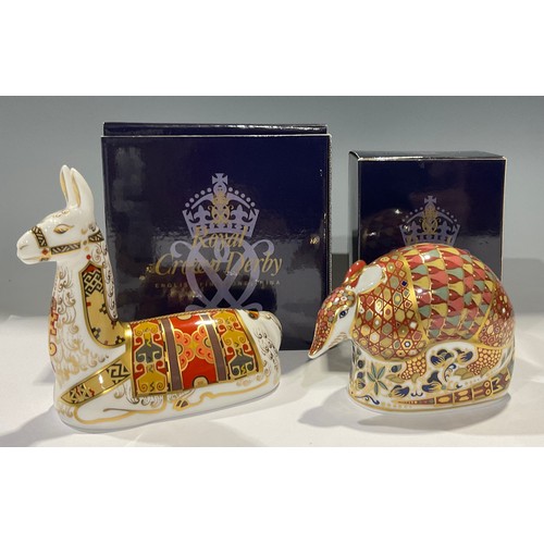 130 - A Royal Crown Derby paperweight, Llama, an exclusive for the Royal Crown Derby Collectors Guild, gol... 