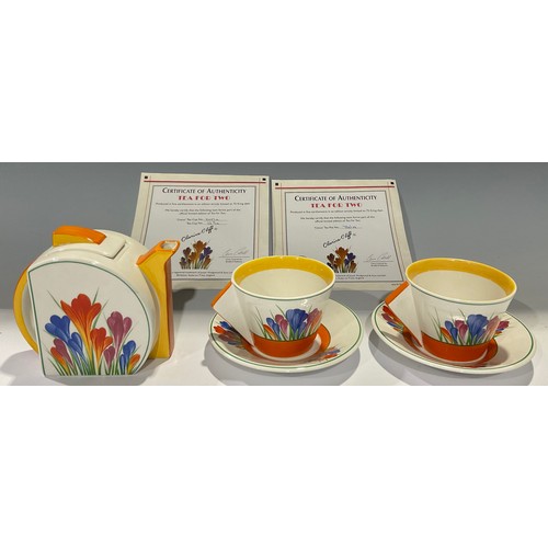 140 - A Bradford Exchange Clarice Cliff Crocus pattern tea for two, teapot, pair of cups and saucers, limi... 