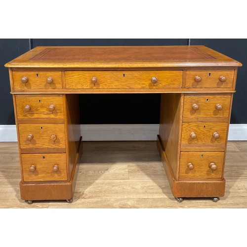 108 - A Victorian oak twin pedestal desk, 106cm wide, c.1880