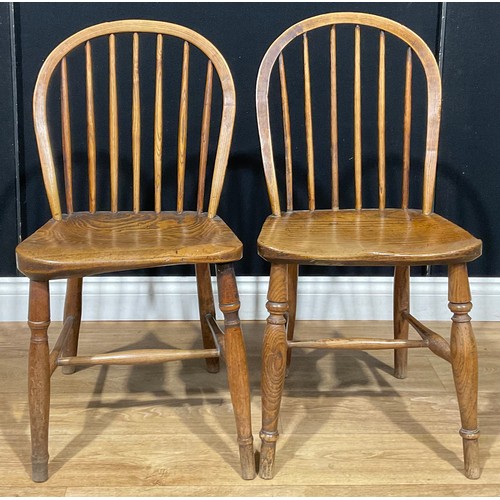 117 - A 19th century ash and elm Windsor side chair; others, similar (4)