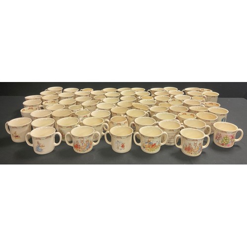 135A - A large collection of Royal Doulton Bunnykins nursery ware cups (approx 74)