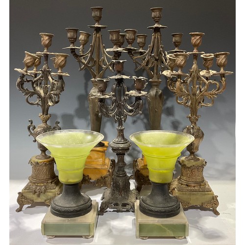 543 - A pair of Rococo style gilt metal garniture, each as four branch, five light candelabra, 48cm high; ... 