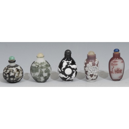 167 - A Chinese Peking glass globular snuff bottle, in cameo with animals in a landscape, 5.5cm high; othe... 