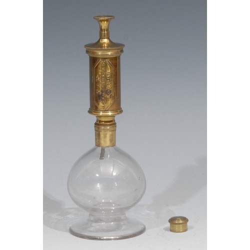 388 - A Victorian gilded brass and clear glass breast pump by S Maw & Son, Thompson Place, London, red vel... 