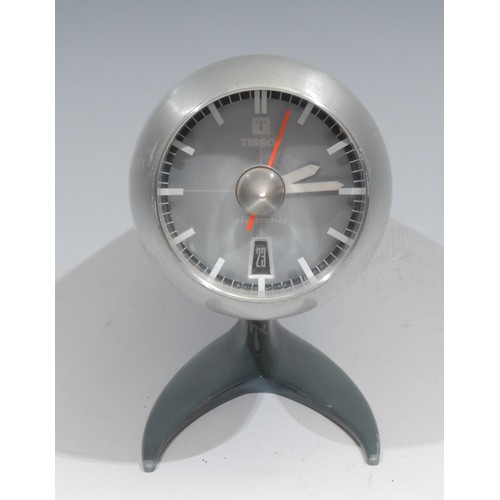 697 - A Tissot Electronic stainless steel jet engine desk clock, silvered dial, baton hour markers, date a... 