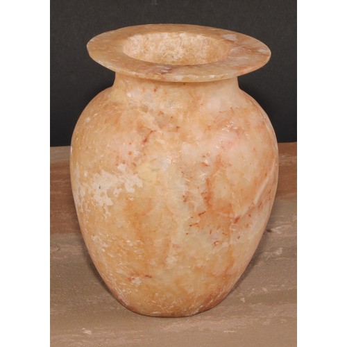 481 - An Egyptian alabaster ovoid vase, 15cm high