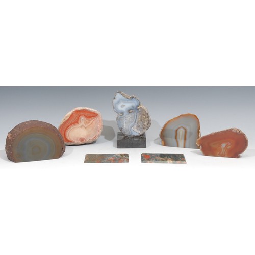 770 - Geology - Five polished agate geode specimens, one mounted; two rectangular agate panels, various co... 